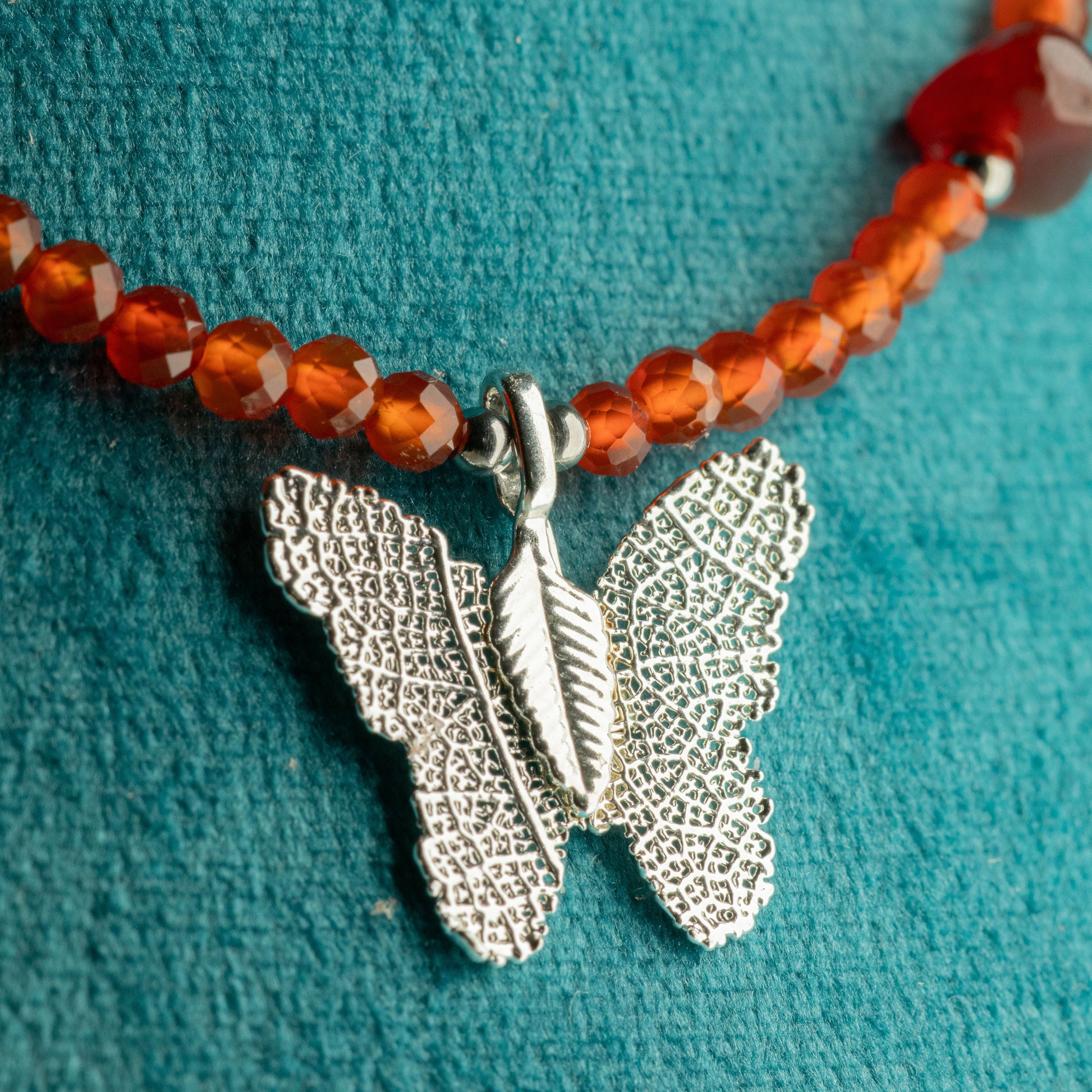 Nymph Ruby Gemstone Necklace with Real Leaf Butterfly Pendant — necklace, image 1 of 9.