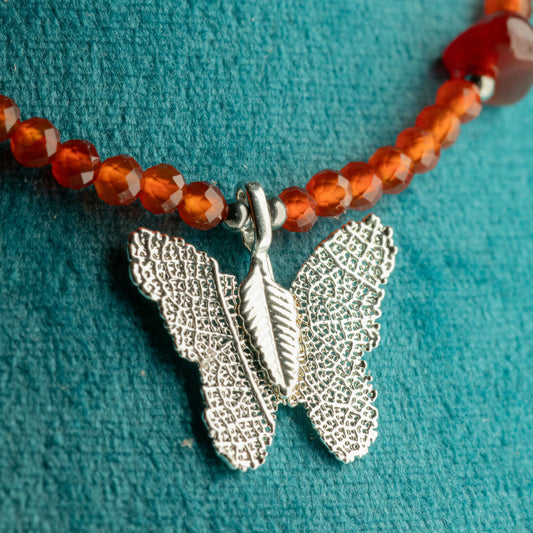 Nymph Ruby Gemstone Necklace with Real Leaf Butterfly Pendant — necklace, image 1 of 9.