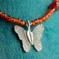 Nymph Ruby Gemstone Necklace with Real Leaf Butterfly Pendant — necklace, image 1 of 9.