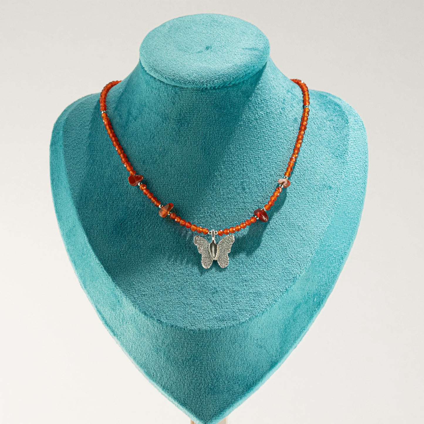 Nymph Ruby Gemstone Necklace with Real Leaf Butterfly Pendant — necklace, image 7 of 9.