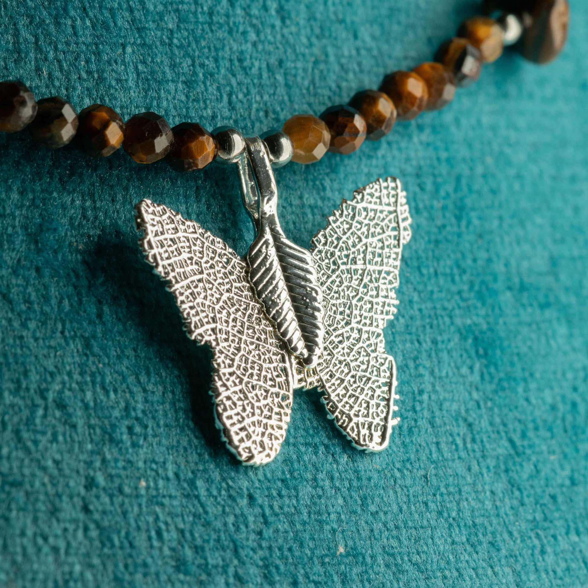 Nymph Tiger's Eye Gemstone Necklace with Real Leaf Butterfly Pendant — necklace, image 6 of 9.