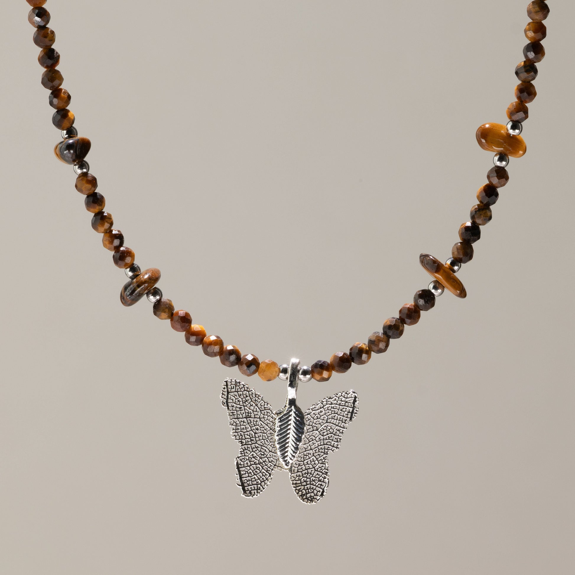 Nymph Tiger's Eye Gemstone Necklace with Real Leaf Butterfly Pendant — necklace, image 1 of 9.