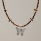 Nymph Tiger's Eye Gemstone Necklace with Real Leaf Butterfly Pendant — necklace, image 1 of 9.
