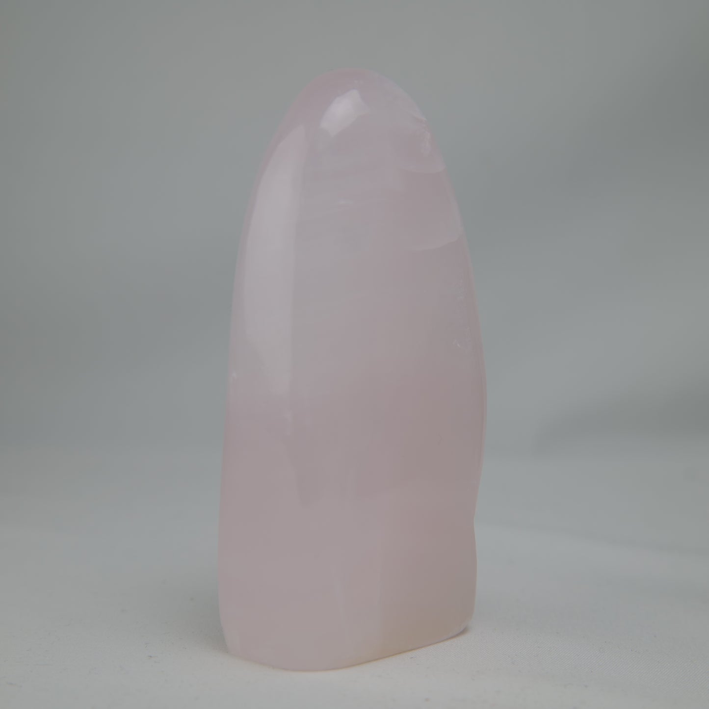 Pink Mangano Calcite freeform 313g polished back view