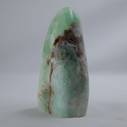 Pistachio Calcite Freeform 389g — minerals, image 2 of 6. alternate view