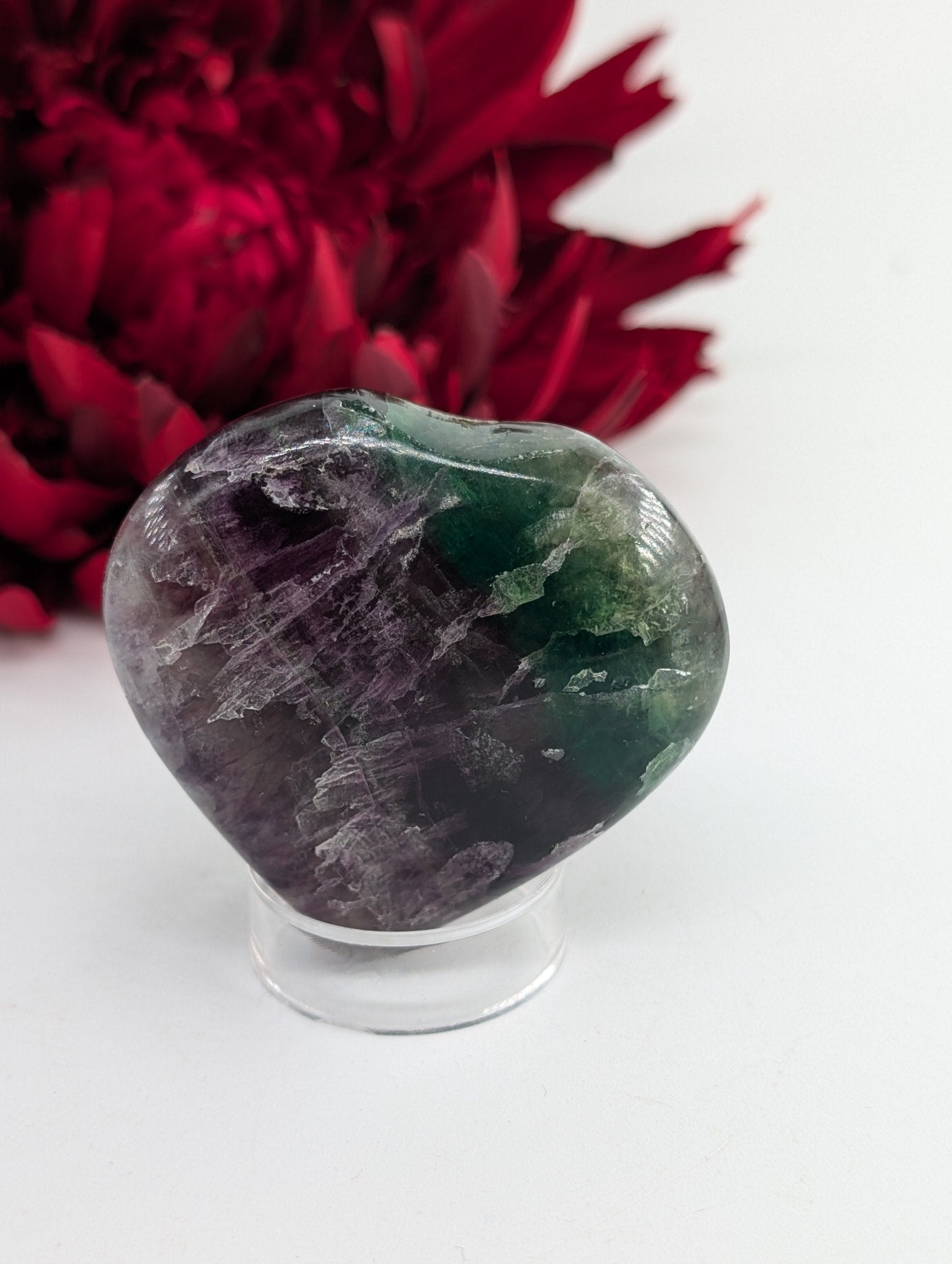 Polished Rainbow Fluorite Heart Palmstone 60mm featuring banded green‑purple hues and glassy clarity - Luna Panther