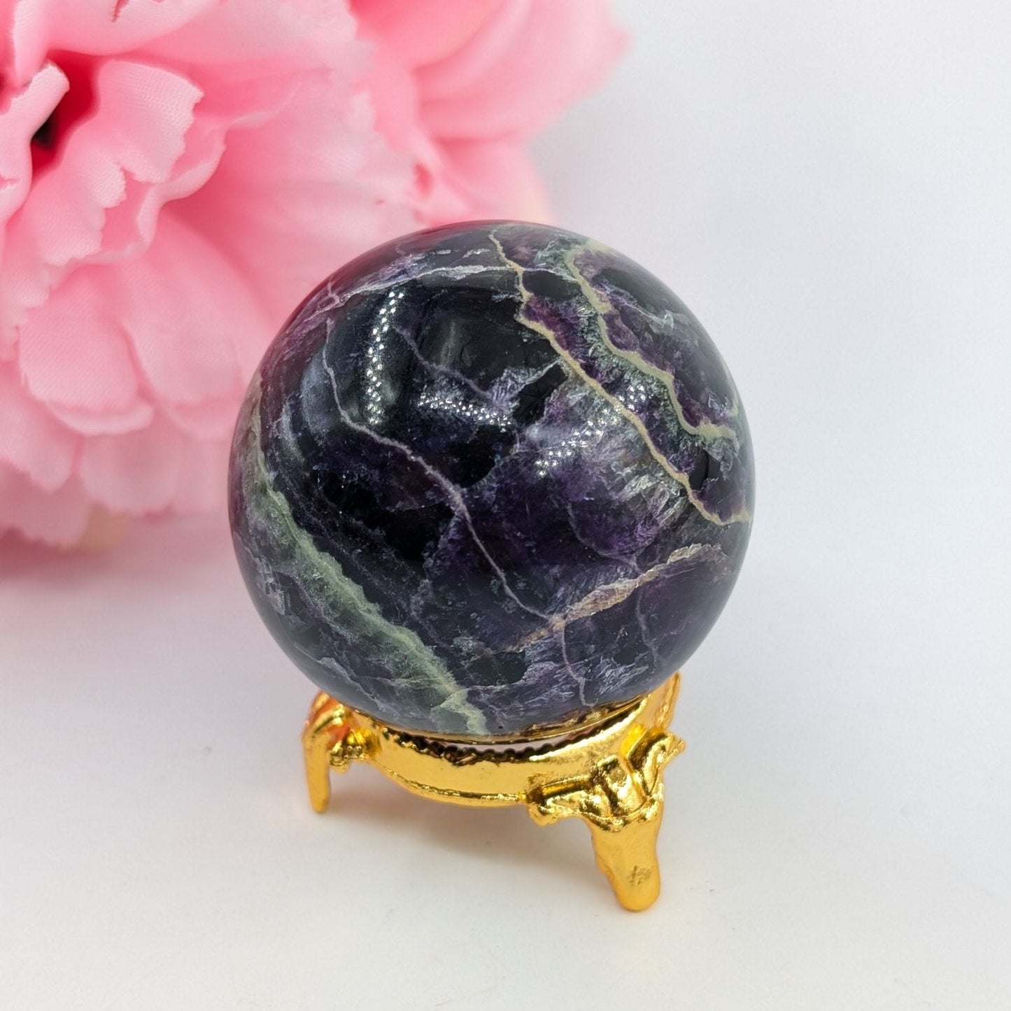 Polished Rainbow Fluorite Sphere - 177g, 48mm featuring banded green‑purple hues and glassy clarity - Luna Panther