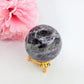 Polished Rainbow Fluorite Sphere - 234g, 53mm featuring banded green‑purple hues and glassy clarity - Luna Panther