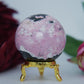Polished Rhodochrosite Sphere – 249g, 52mm featuring pink bands and glassy finish - Luna Panther