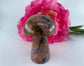 Polished Rhodonite Mushroom 115grams featuring pink tone with black veining - Luna Panther