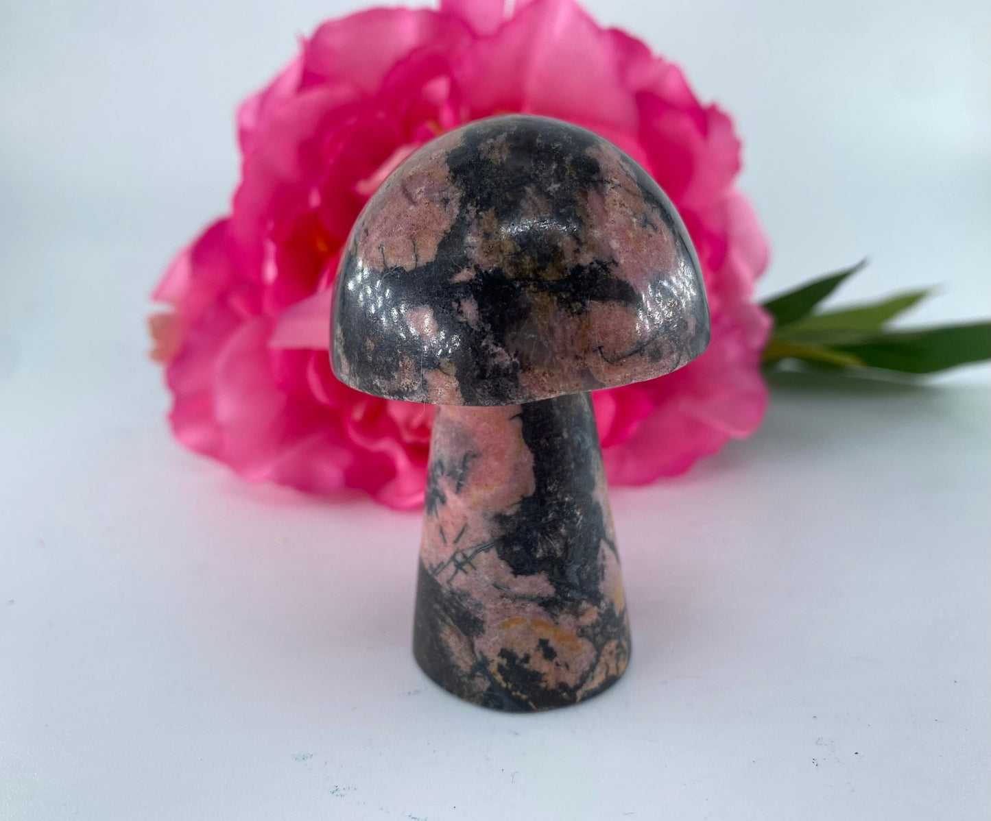 Polished Rhodonite Mushroom 140grams featuring pink tone with black veining - Luna Panther