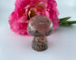 Polished Rhodonite Mushroom 85grams featuring pink tone with black veining - Luna Panther