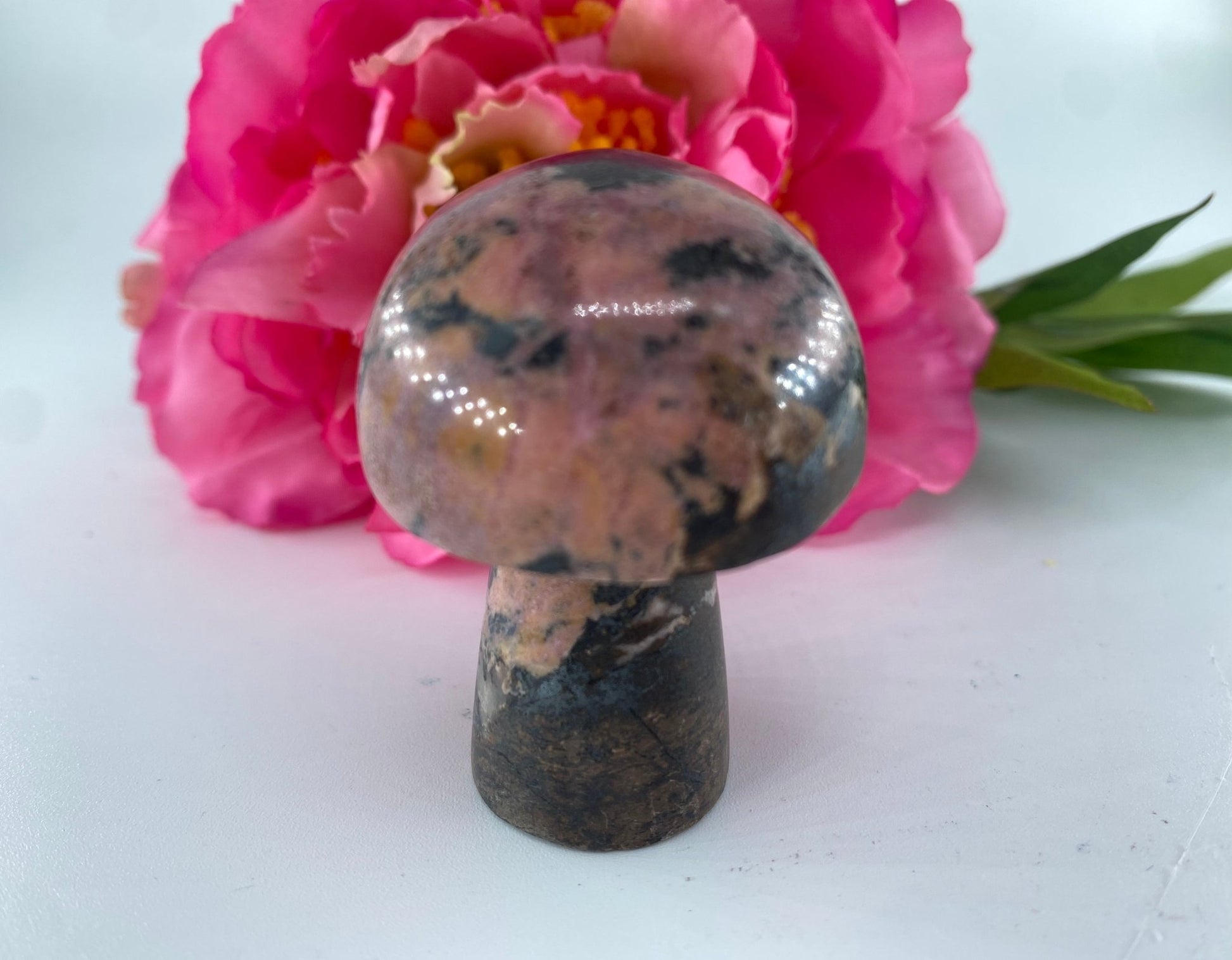 Polished Rhodonite Mushroom 95grams featuring pink tone with black veining - Luna Panther