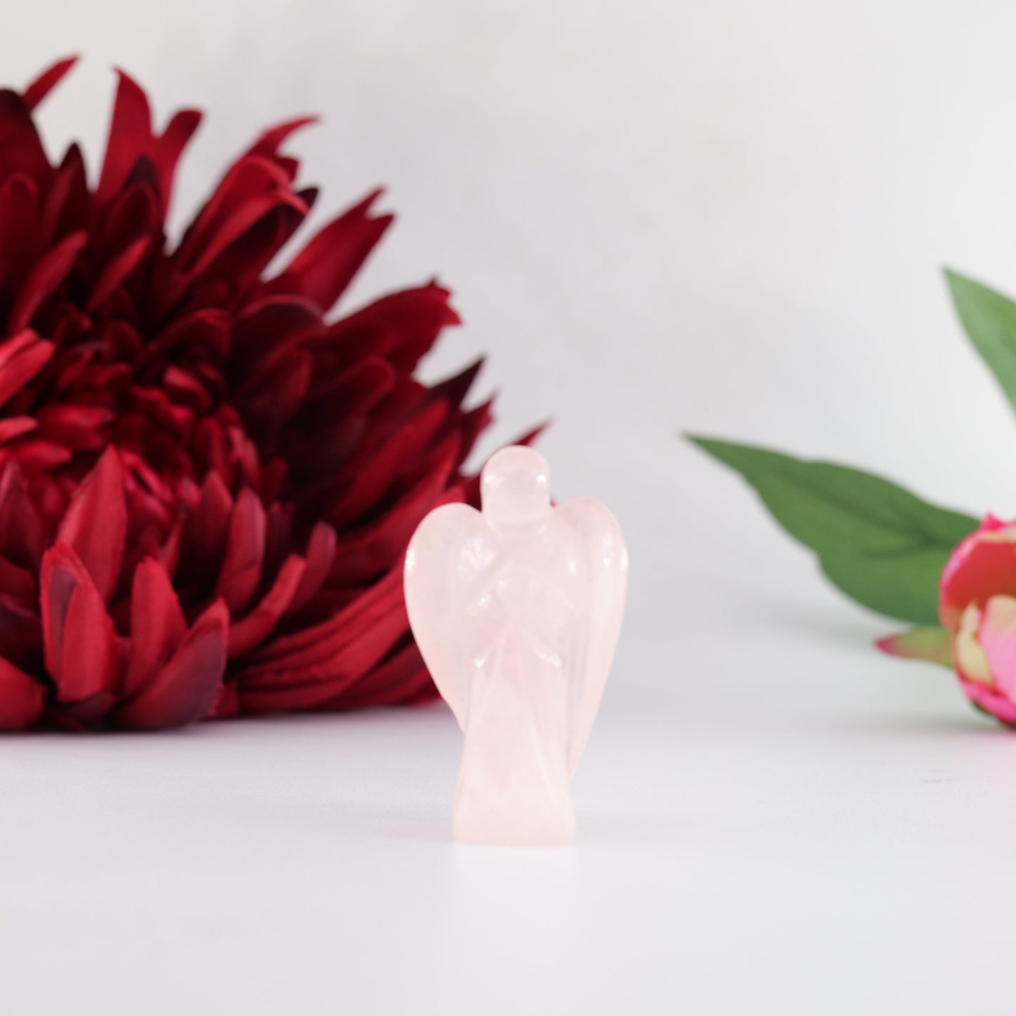 Polished Rose Quatrtz Angel 55Mm featuring natural patterning and unique variations - Luna Panther