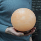 Polished Salt Lamp Ball Big Wooden Base 1 featuring natural patterning and unique variations - Luna Panther