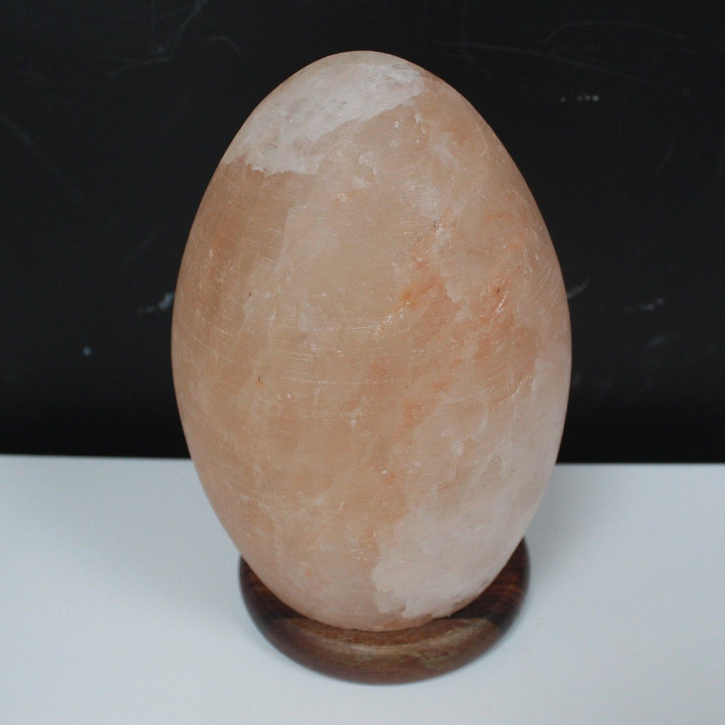 Polished Salt Lamp Egg Wooden Base featuring natural patterning and unique variations - Luna Panther