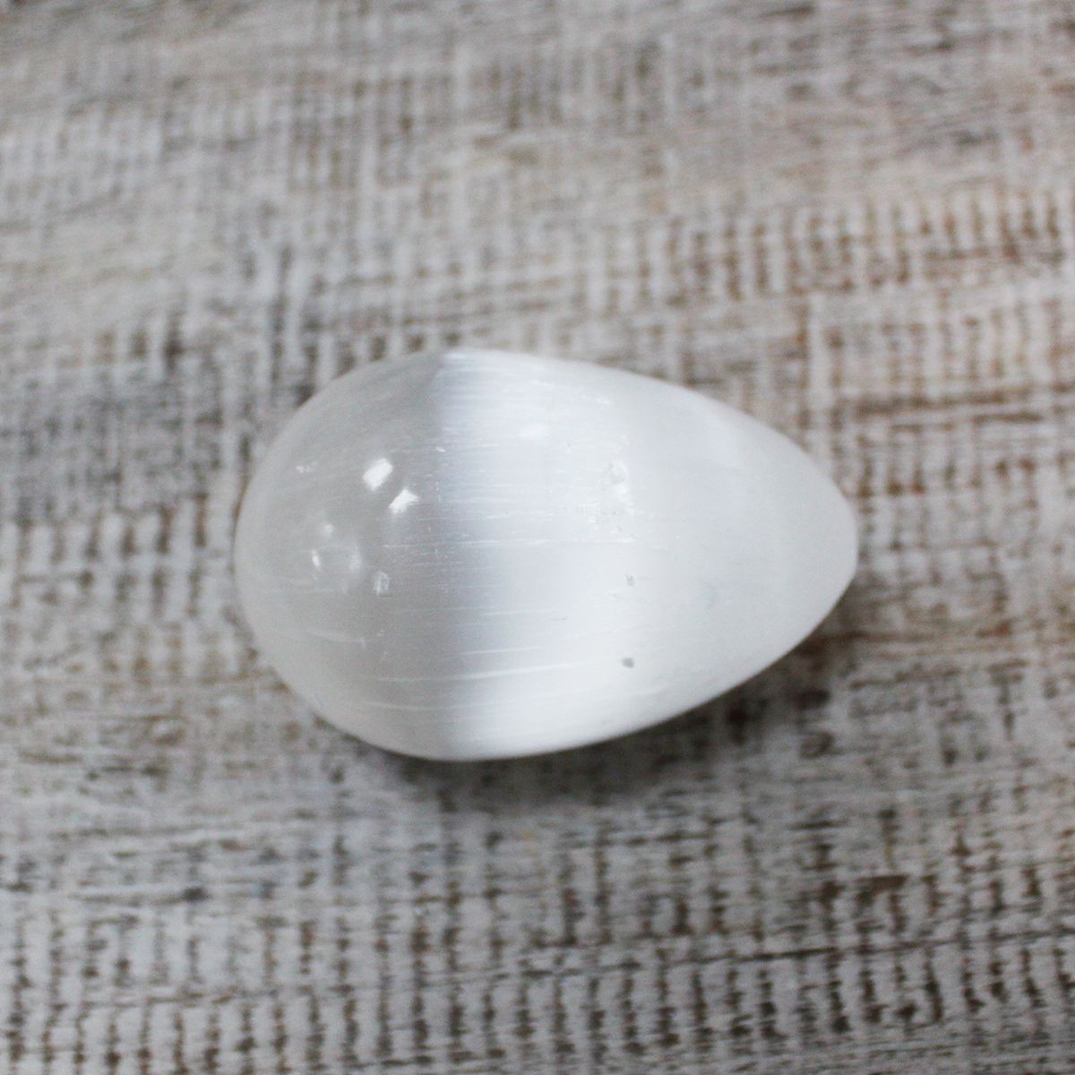 Polished Selenite Egg - 5 - 6 cm featuring satin white sheen and fibrous texture - Luna Panther