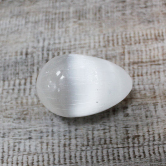 Polished Selenite Egg - 5 - 6 cm featuring satin white sheen and fibrous texture - Luna Panther