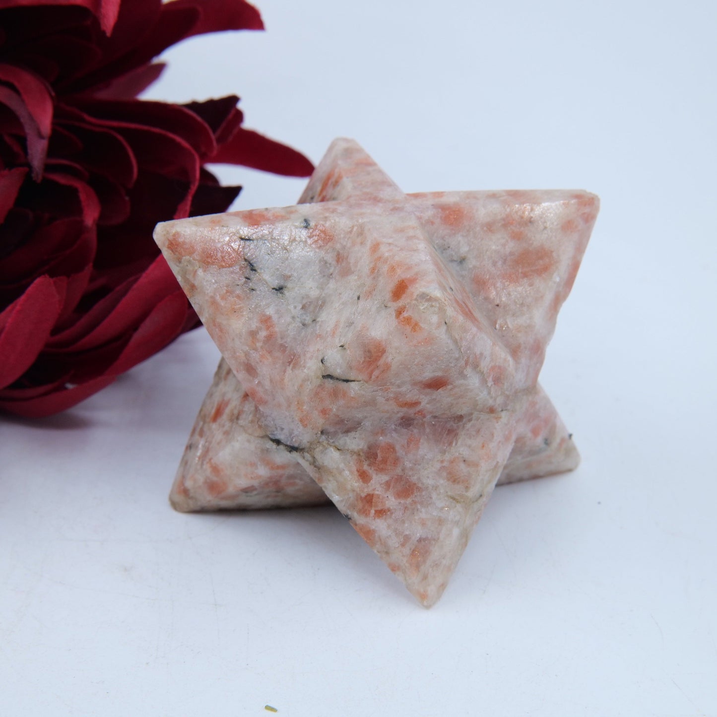 Polished Sunstone Merkaba Star 250g featuring sparkling aventurescence and warm orange tone - Luna Panther