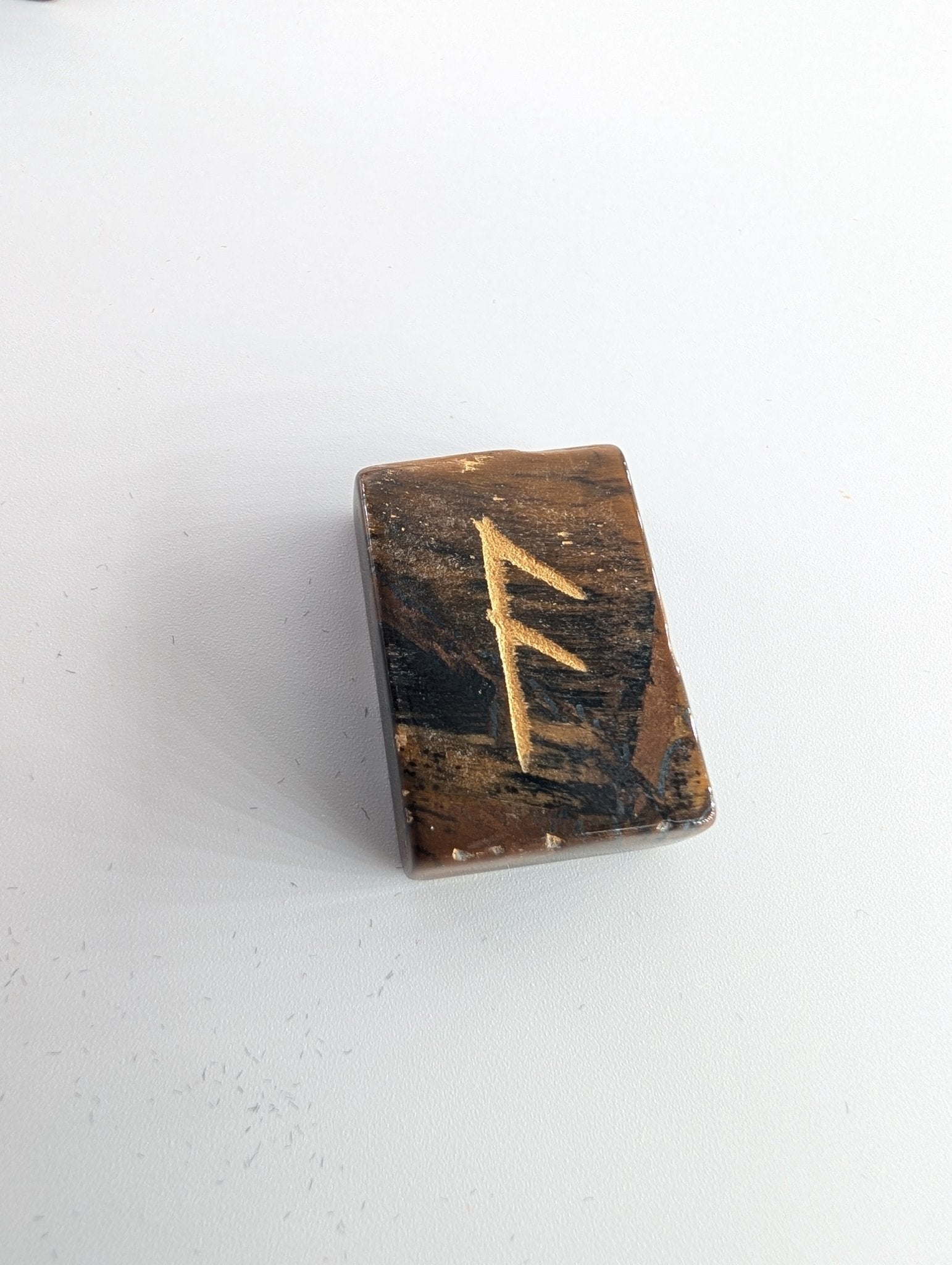Polished Tiger Rune Set And Bag Polished Elder Futhark Runes featuring natural patterning and unique variations - Luna Panther