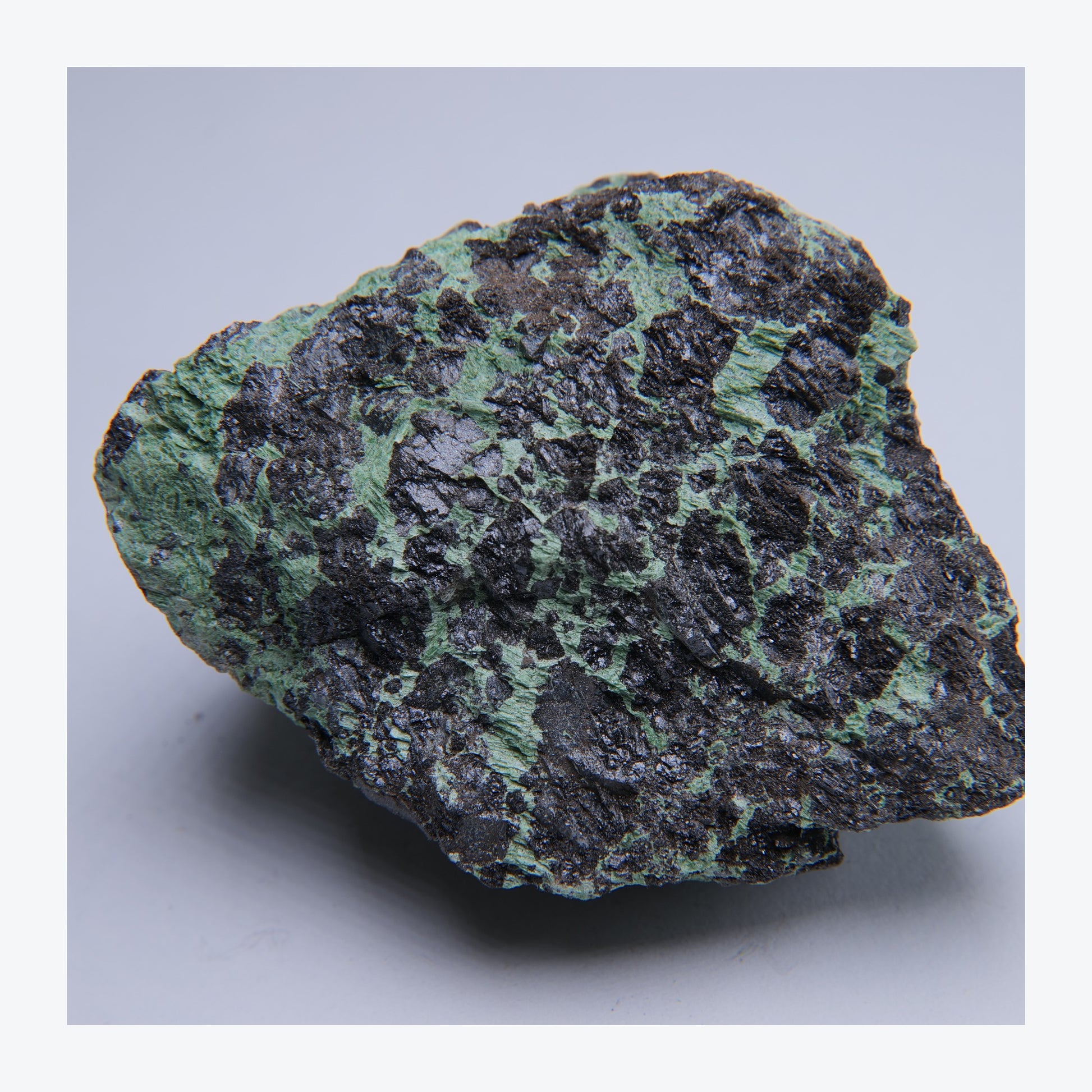 Green and black mineral specimen, 232g