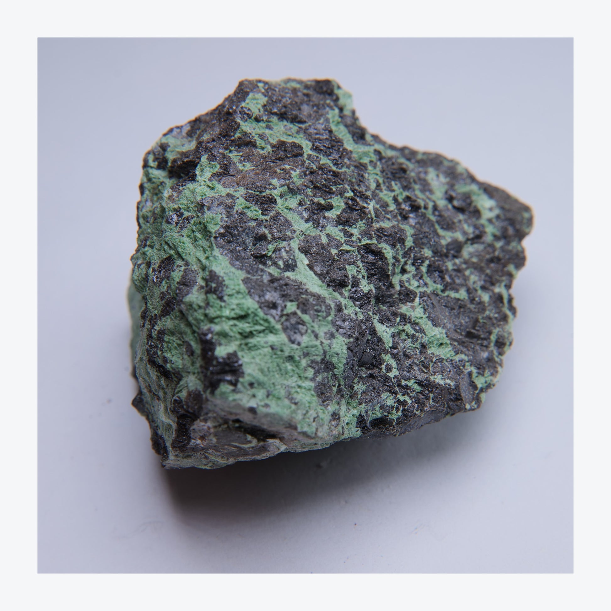 Green and black mineral specimen, 232g