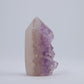 Close-up of sparkling druzy crystals on small Uruguay amethyst point
