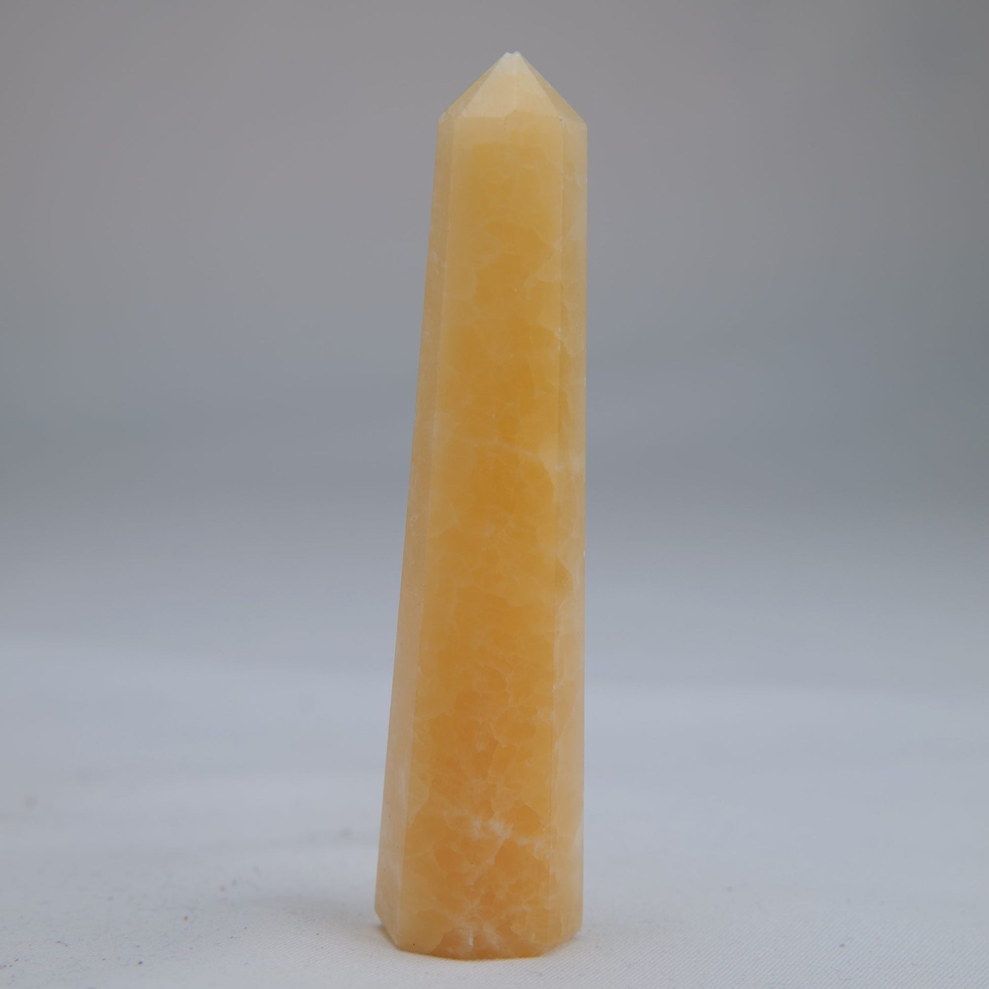Yellow Banded Calcite Crystal Point 80mm 43g - Luna Panther