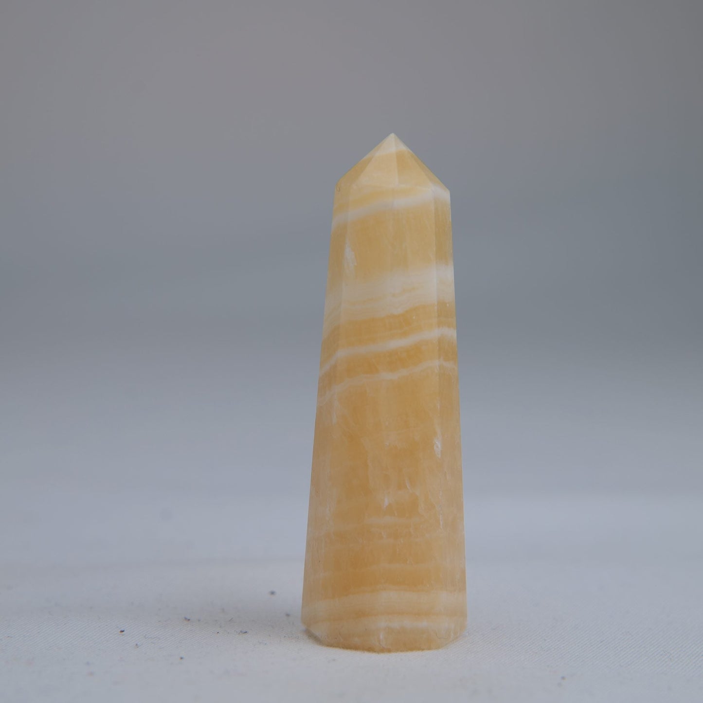 Yellow Banded Calcite Point 60mm 30g - Luna Panther