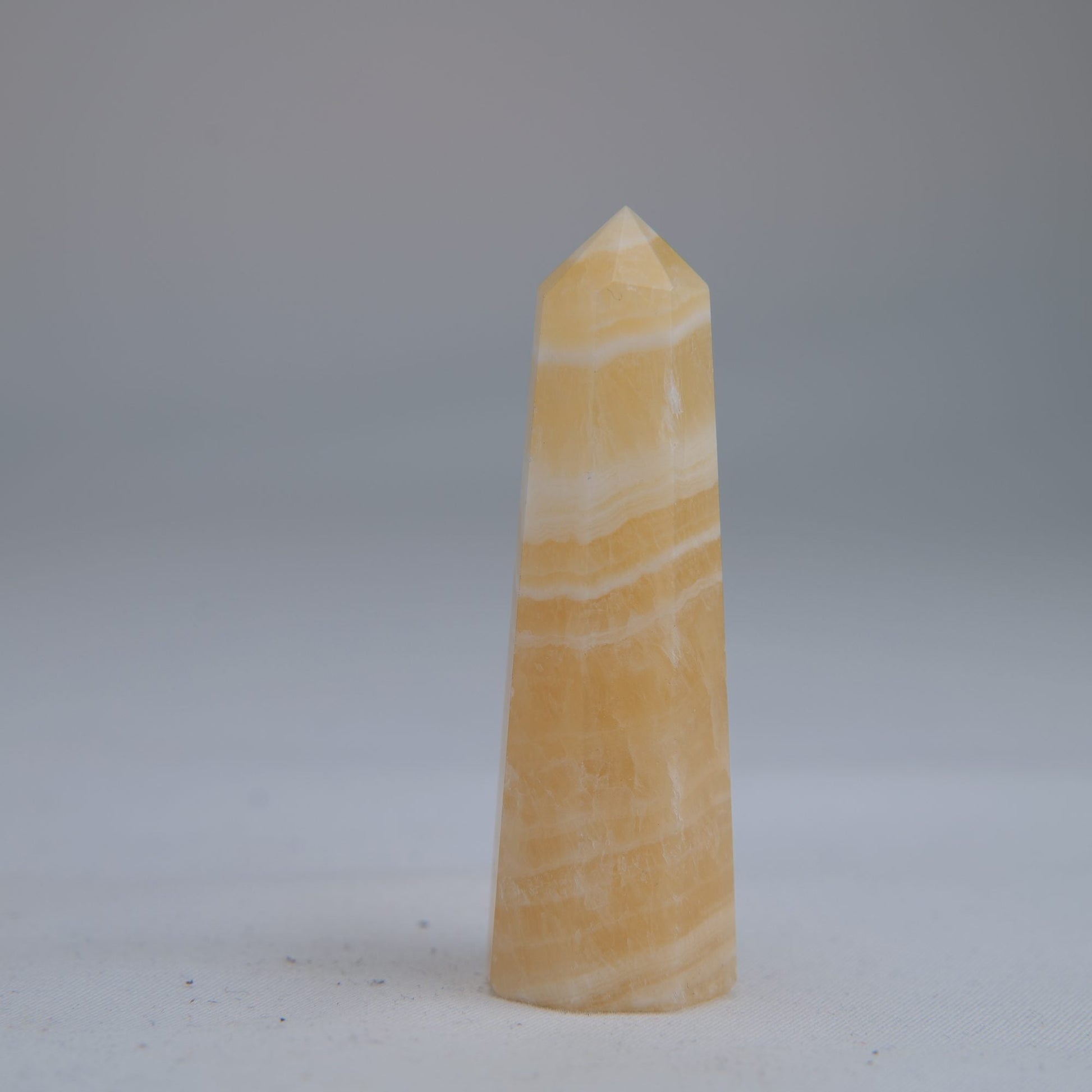 Yellow Banded Calcite Point 60mm 30g - Luna Panther