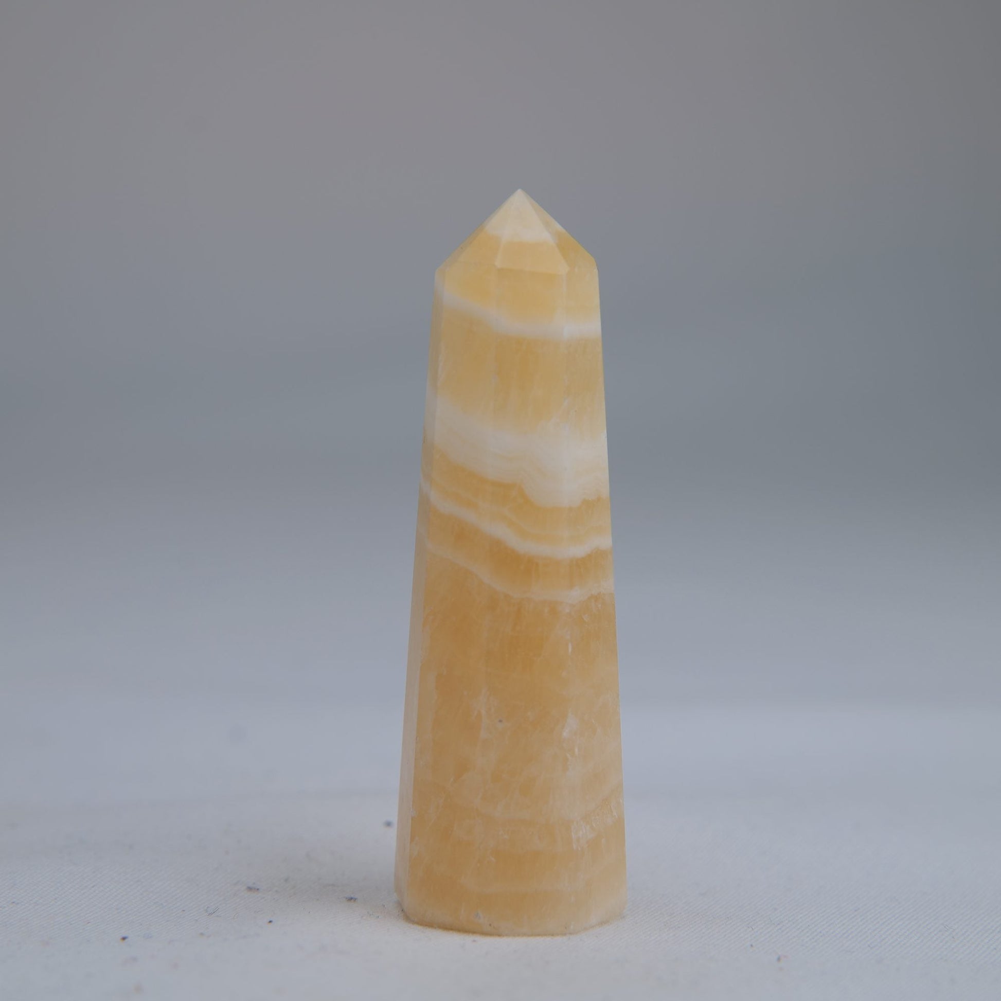 Yellow Banded Calcite Point 60mm 30g - Luna Panther