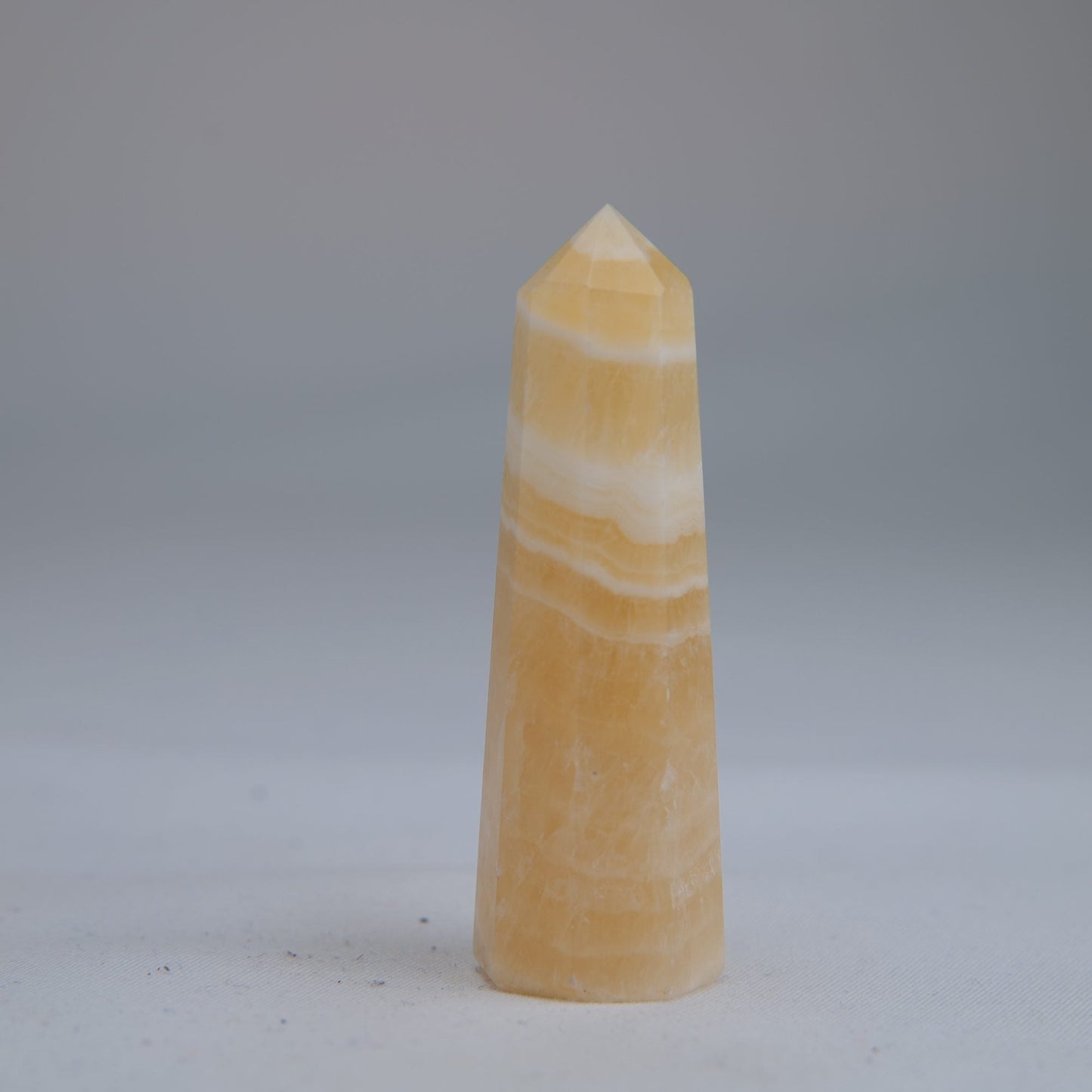 Yellow Banded Calcite Point 60mm 30g - Luna Panther