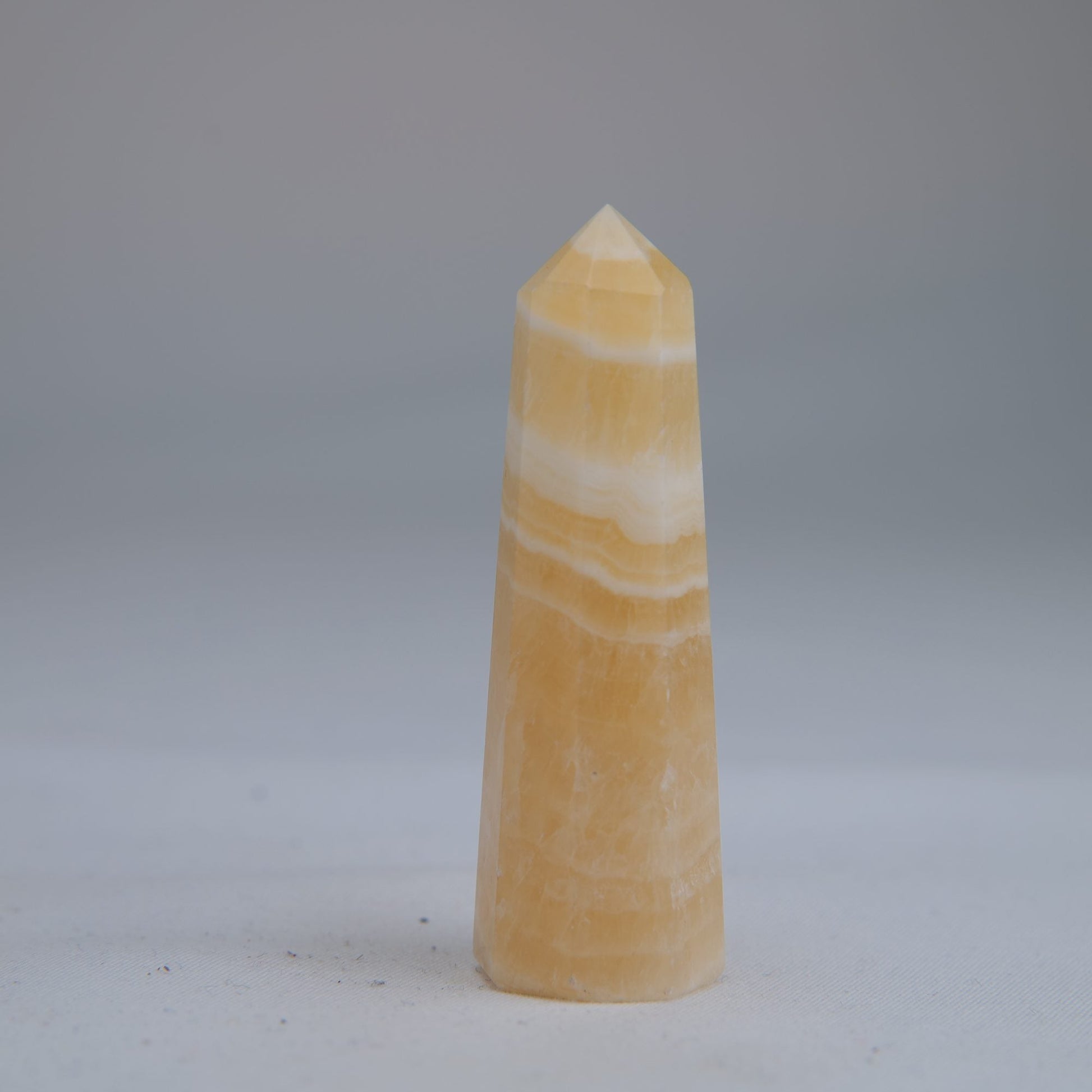 Yellow Banded Calcite Point 60mm 30g - Luna Panther