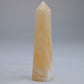 Yellow Banded Calcite Point 75mm 45g - Luna Panther