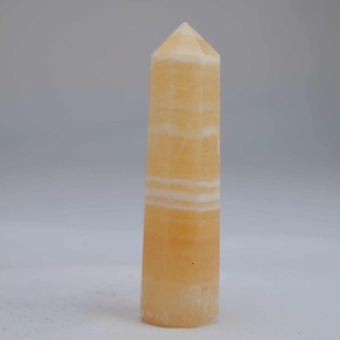Yellow Banded Calcite Point 75mm 49g - Luna Panther