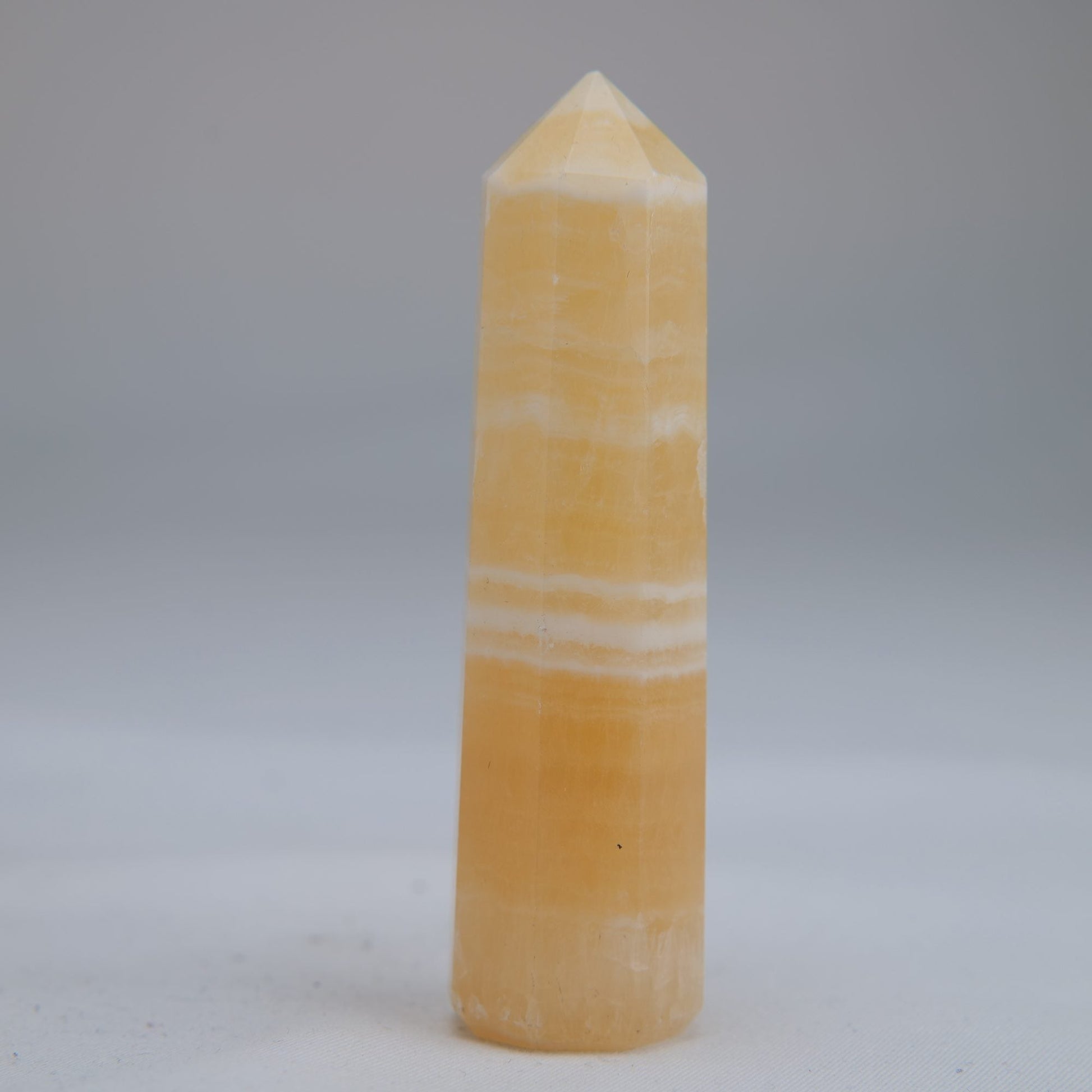 Yellow Banded Calcite Point 75mm 49g - Luna Panther