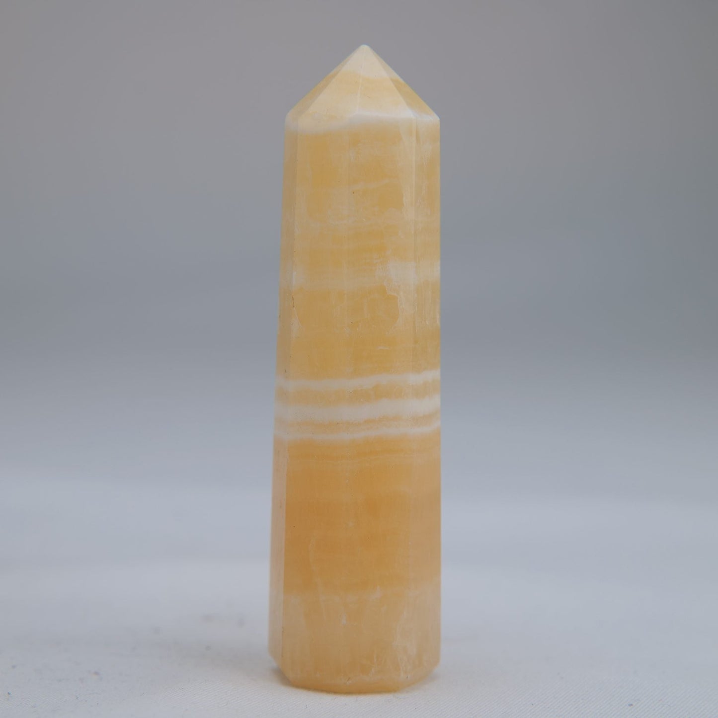 Yellow Banded Calcite Point 75mm 49g - Luna Panther