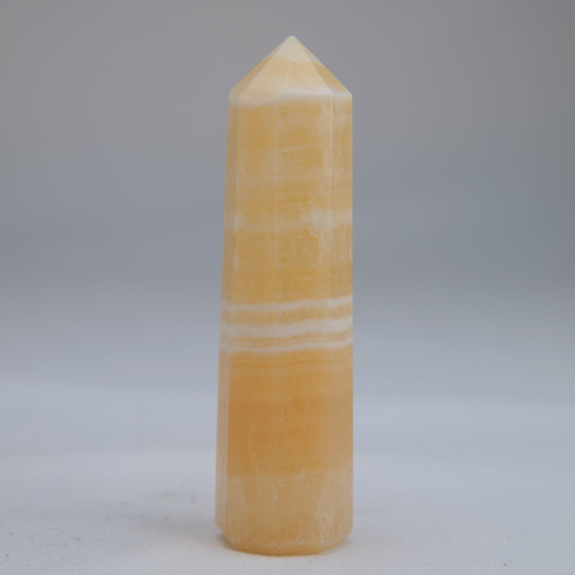 Yellow Banded Calcite Point 75mm 49g - Luna Panther