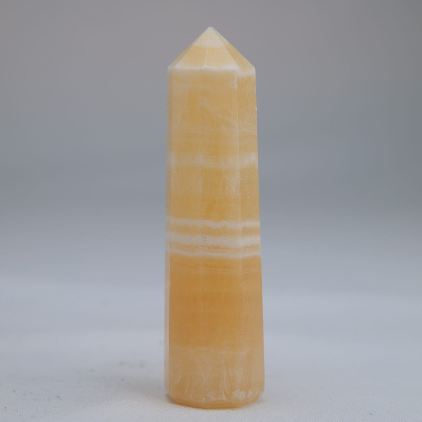 Yellow Banded Calcite Point 75mm 49g - Luna Panther
