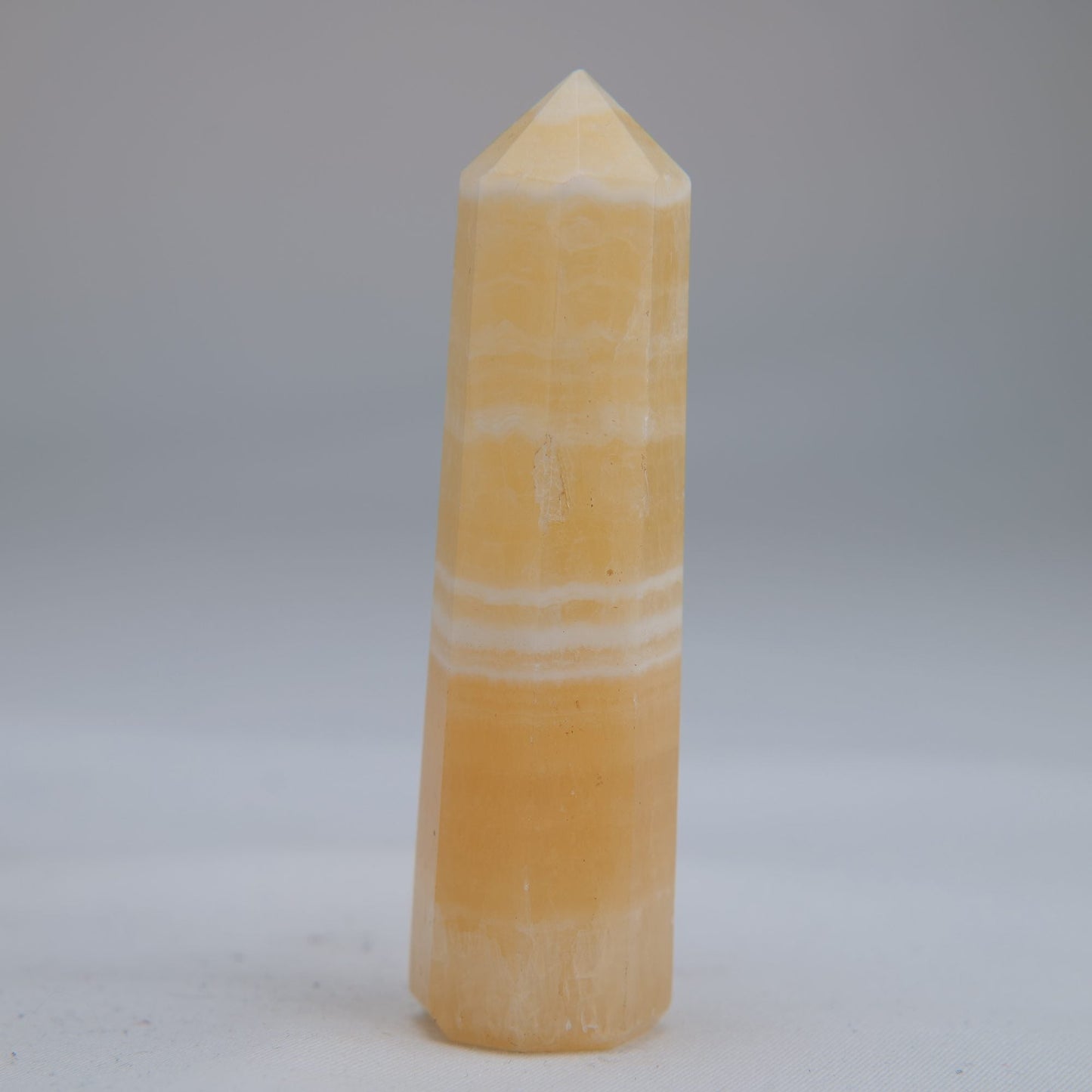 Yellow Banded Calcite Point 75mm 49g - Luna Panther