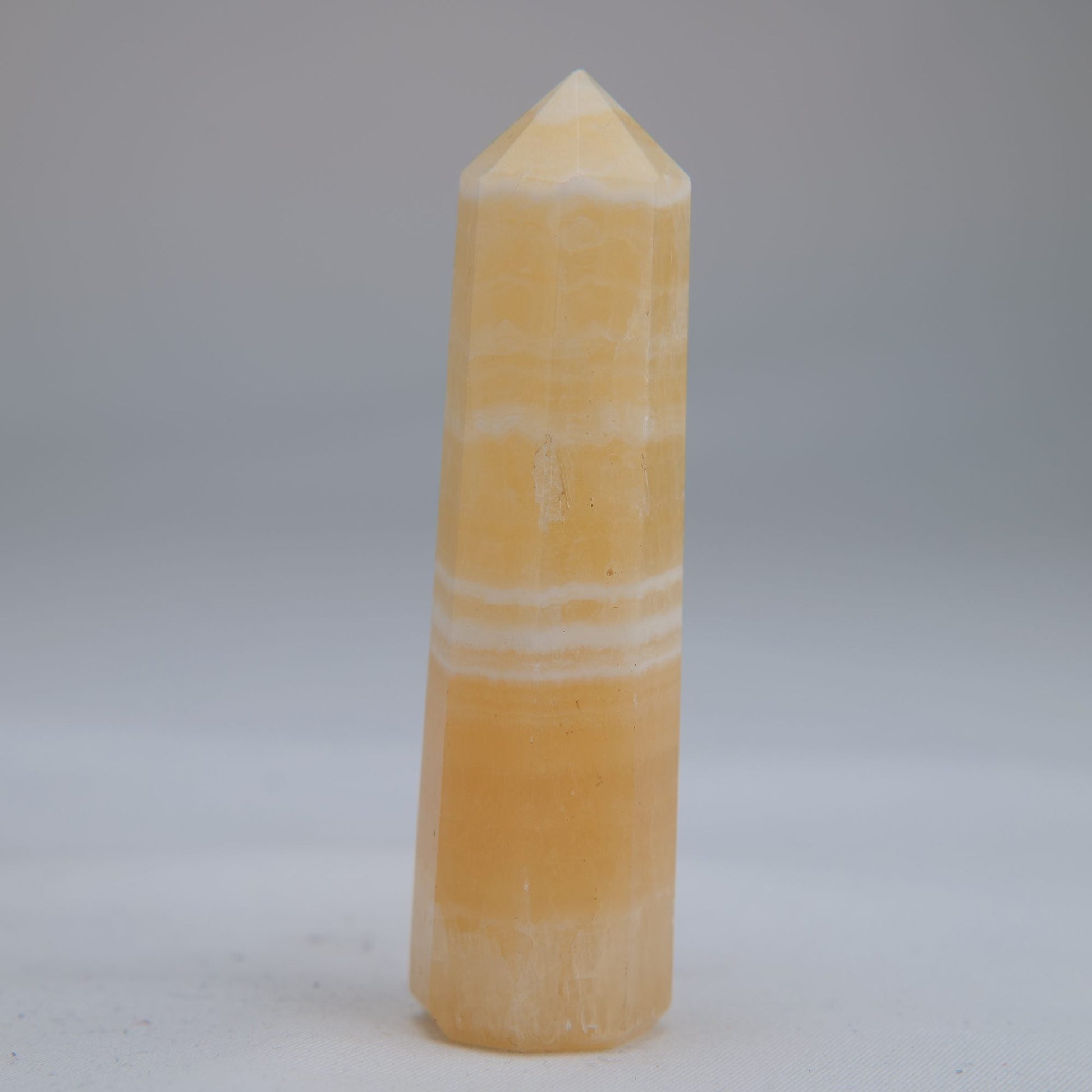 Yellow Banded Calcite Point 75mm 49g - Luna Panther